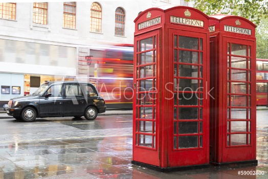 Bild på Red Phone cabines in London and vintage taxiRainy day